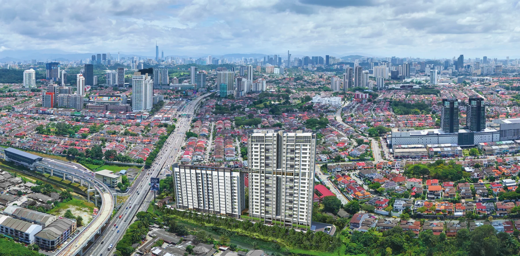 Aerial view of Stellar Damansara among the Damansara Jaya skyline, artist's impression